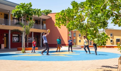 A residential student doing their laundry at AKA Maputo.