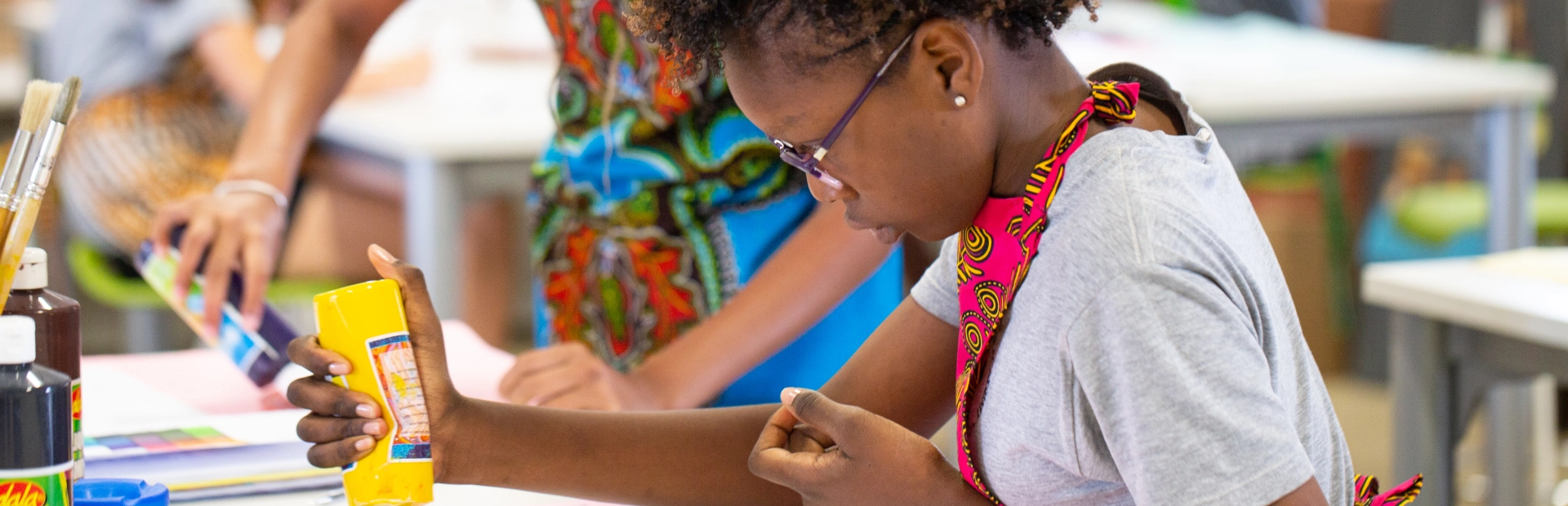 Student is mixing colours in art class
