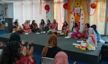 Teachers perform music together during a professional development event at AKA Dhaka.